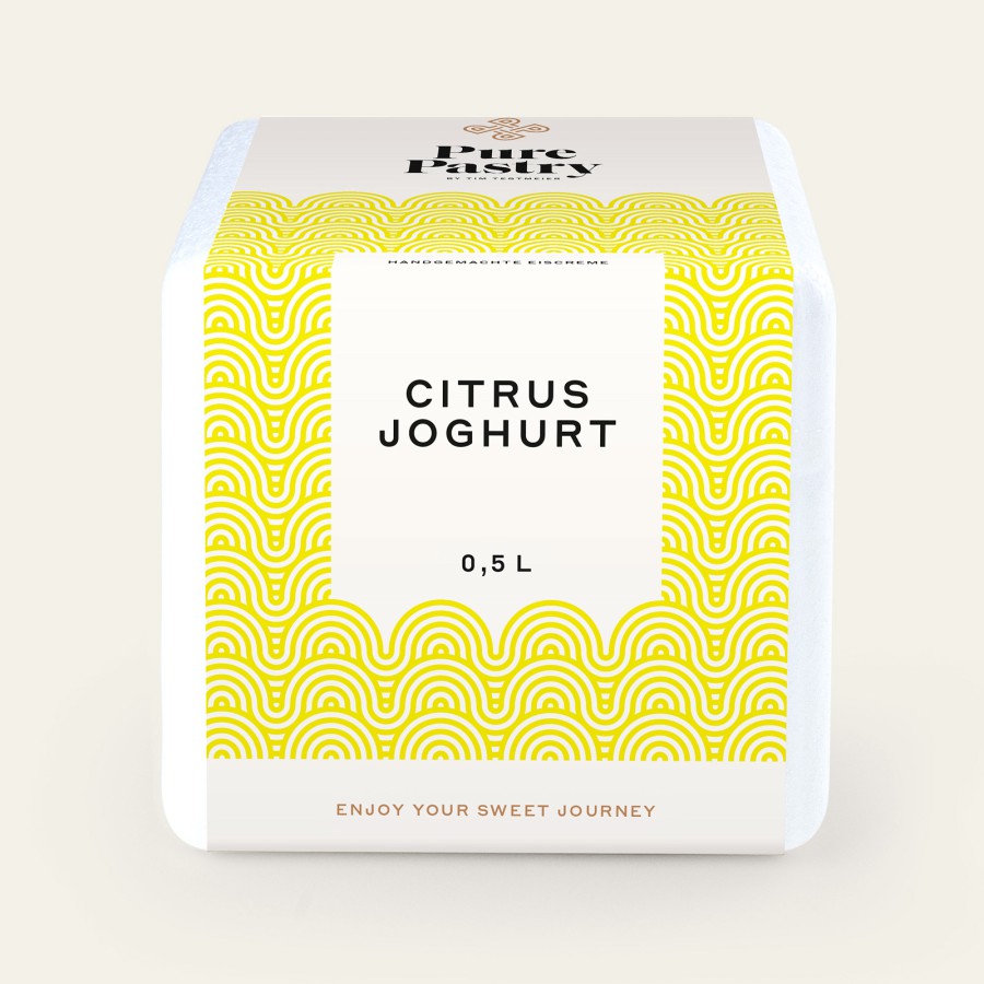 White folding box featuring a yellow corporate design with a wave pattern and the text “Citrus Yogurt 0.5 L – Pure Pastry, Enjoy your sweet journey”